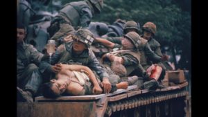 Marines on top of tank being evacuated in Vietnam.  The great financial reset is coming.