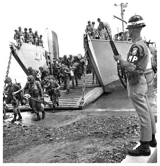 The initial US troops stepping off a landing craft.  This marks the first landing in Vietnam for US troops.The Libor scandal is yet another example of how bankers openly commit crimes that the peasant citizens would go to jail for.  They do not even try to hide it anymore.  Silver made me sorry I served as a Marine because the truth is coming out.