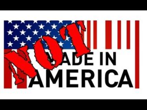 A made in America sign with the words stamped "NOT" across it.